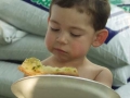 Alexander with Pizza